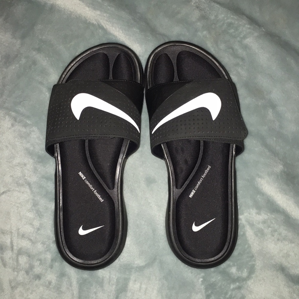 Brand new Nike black slides